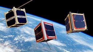 Gruppo di satelliti CubeSat intorno alla terra - Copyright ESA/Medialab